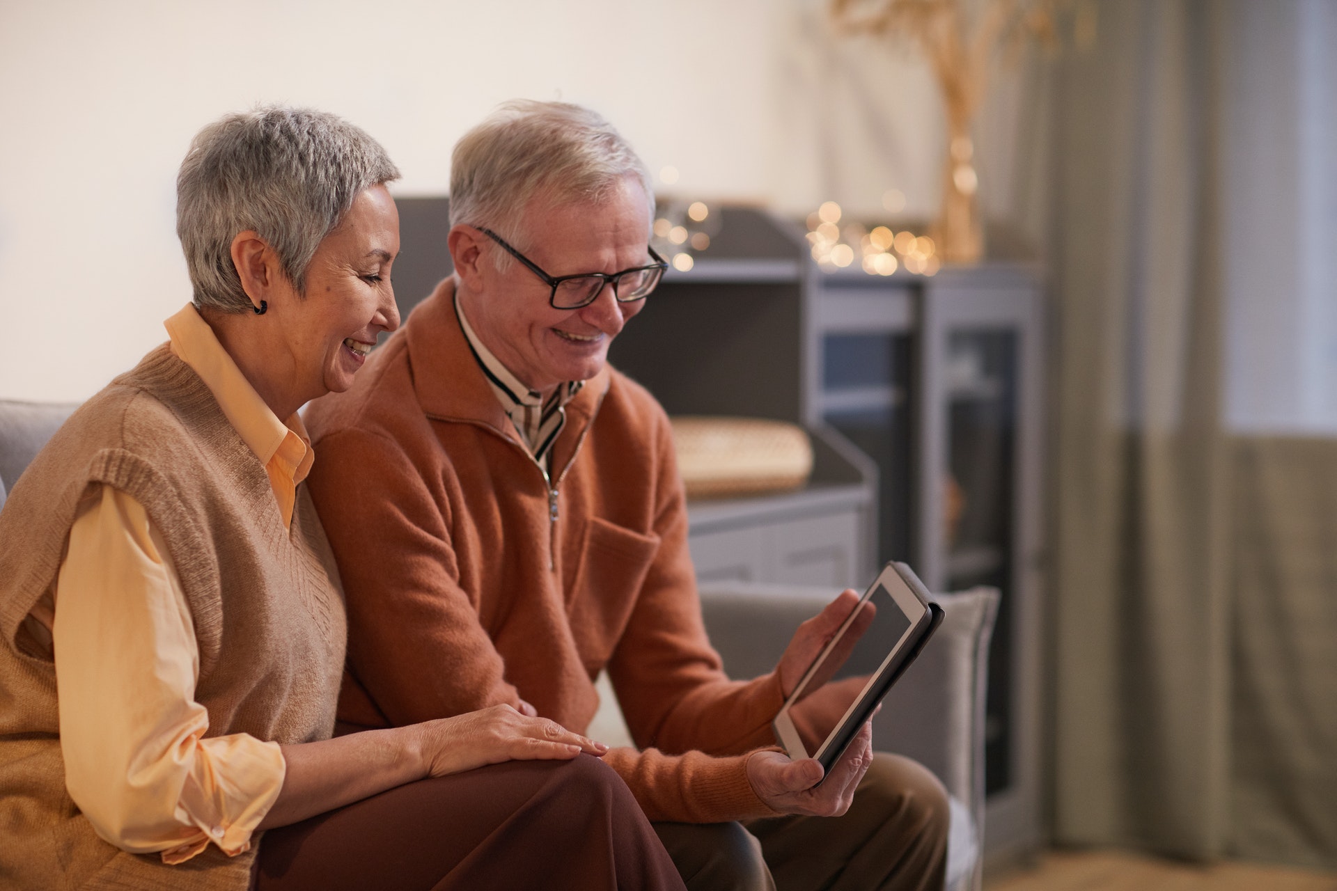 couple looking at tablet